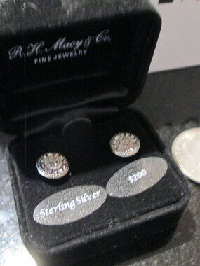 Sterling silver small round sparkly diamond earrings from Macys' Unisex